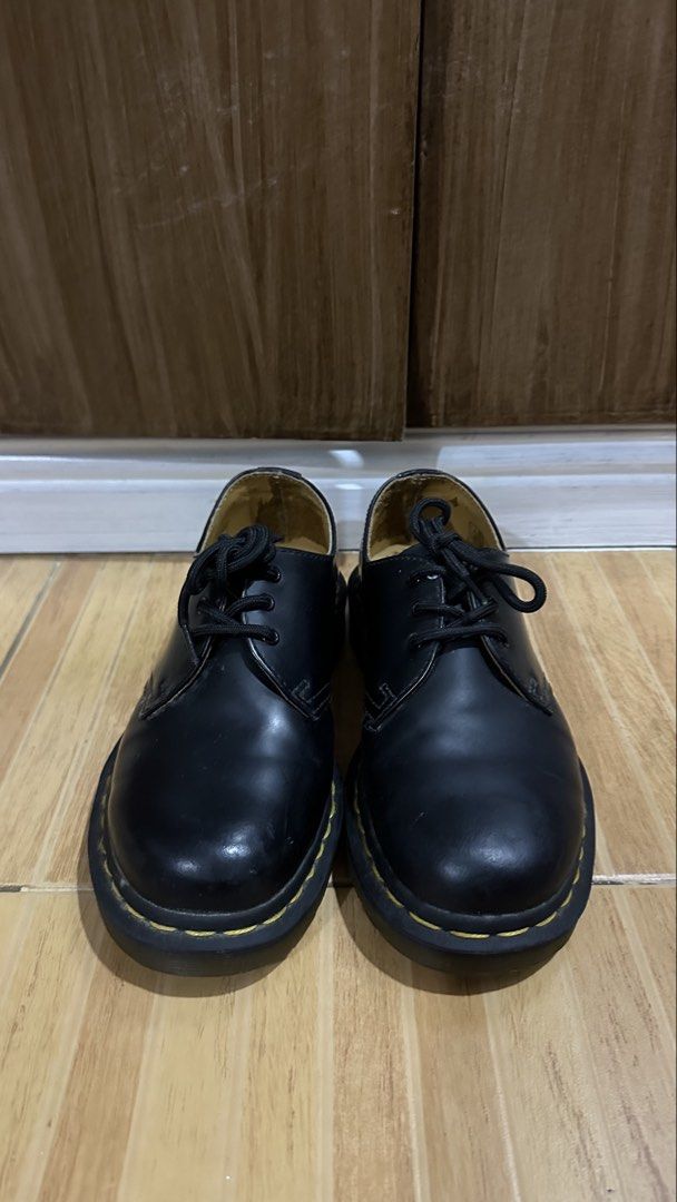 Dr. Martens 1461 Black | UK 4 | Authentic (Category: Boots) located in Muntinlupa City. Submitted by pgba_ (Listing ID 1457280416, Image 2). Description: Authentic Dr. Martens 1461 UK 4 / US 5 M UK 5 / US 6.5 W Condition: Pre-loved, with noticeable interior wear — scuffing, discoloration, and some peeling on the insoles. Still intact and wearable. Please see photos for actual condition. RFS: No longer used Negotiable! :).