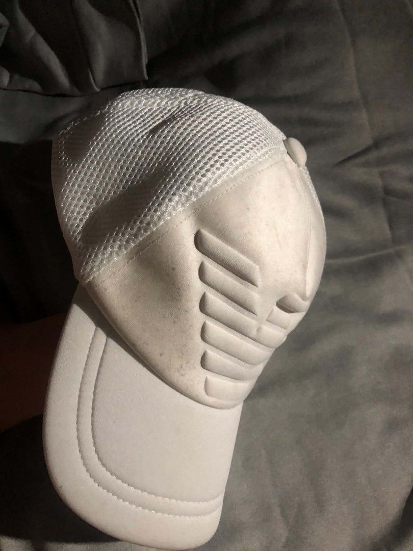 Emporio Armani White Cap (Category: Caps & Hats) located in Castillejos. Submitted by fnds_wr (Listing ID 1457320003, Image 2). Description: - Authentic Emporio Armani cap - White trucker style - Iconic eagle logo embossed on front - Breathable mesh back - Made in China - Authenticity can be checked on certilogo.com or armani.com.
