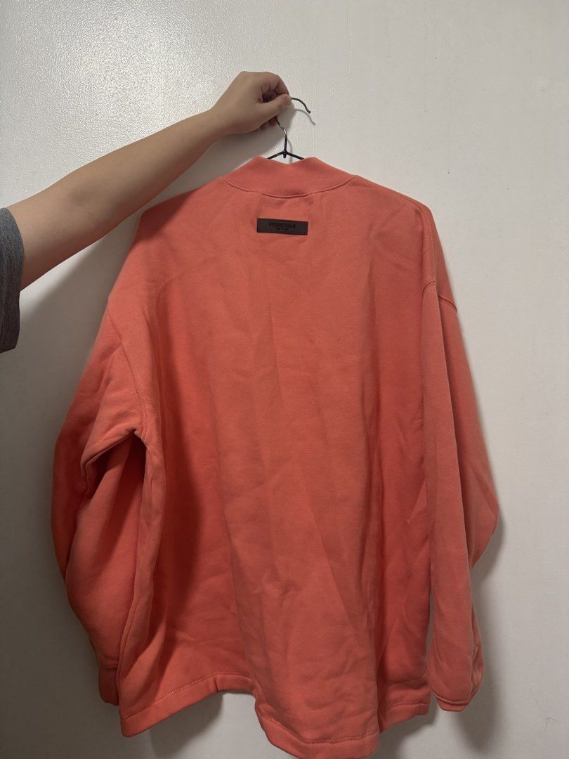 Fear of God Essentials (Category: Hoodies) located in Manila. Submitted by mystic_morty (Listing ID 1457145744, Image 2). Description: 🔥 FOR SALE: Fear of God Essentials Crewneck Sweatshirt – Coral • Brand: Fear of God Essentials�• Size: Men’s XS�• Color: Coral�• Condition: 9.5/10 – worn once only�• Bought in Canada 🇨🇦�• Authentic & well-kept�• No stains, holes, or noticeable flaws 💰 Selling Price: ₱4,500— negotiable for sure buyers 📍 Quezon