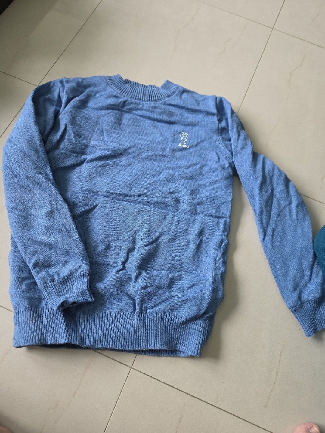 Fleeced lining pullover (Category: Babies & Kids Fashion) located in Singapore. Submitted by lindaolm (Listing ID 1457164414, Image 1). Description: - Comfy blue pullover with fleeced lining for warmth - Textured pattern and embroidered logo detail - Suitable for boys and girls - Recommended for ages 8-12 years - Ideal for everyday wear and layering - Meetups available at Pioneer MRT or Jurong West Street 93.