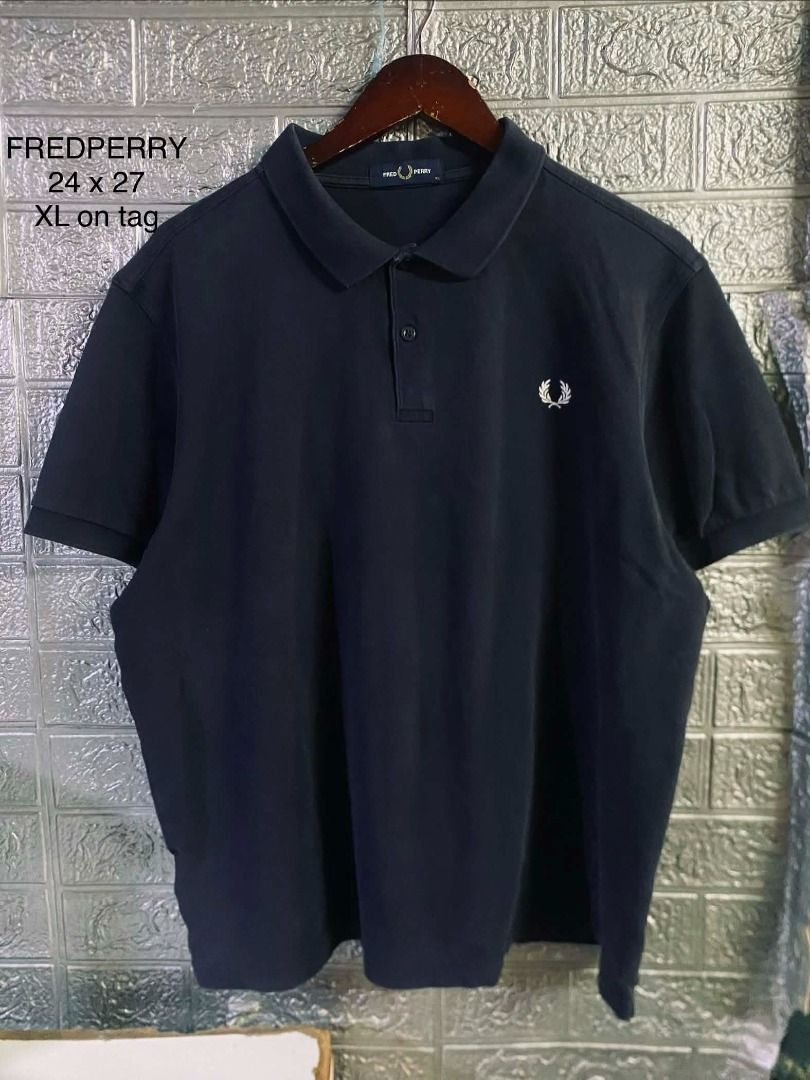 Fred Perry Navy Blue Polo Shirt XL (Category: Tshirts & Polo Shirts ) located in Marikina City. Submitted by pamahyzel194981 (Listing ID 1457201809, Image 1). Description: - Fred Perry Polo Shirt - Color: Navy Blue - Size: XL (fits like XL) - Chest Logo: Classic laurel wreath - Measurements: 24 inches width, 27 inches length - Origin: Made in China.