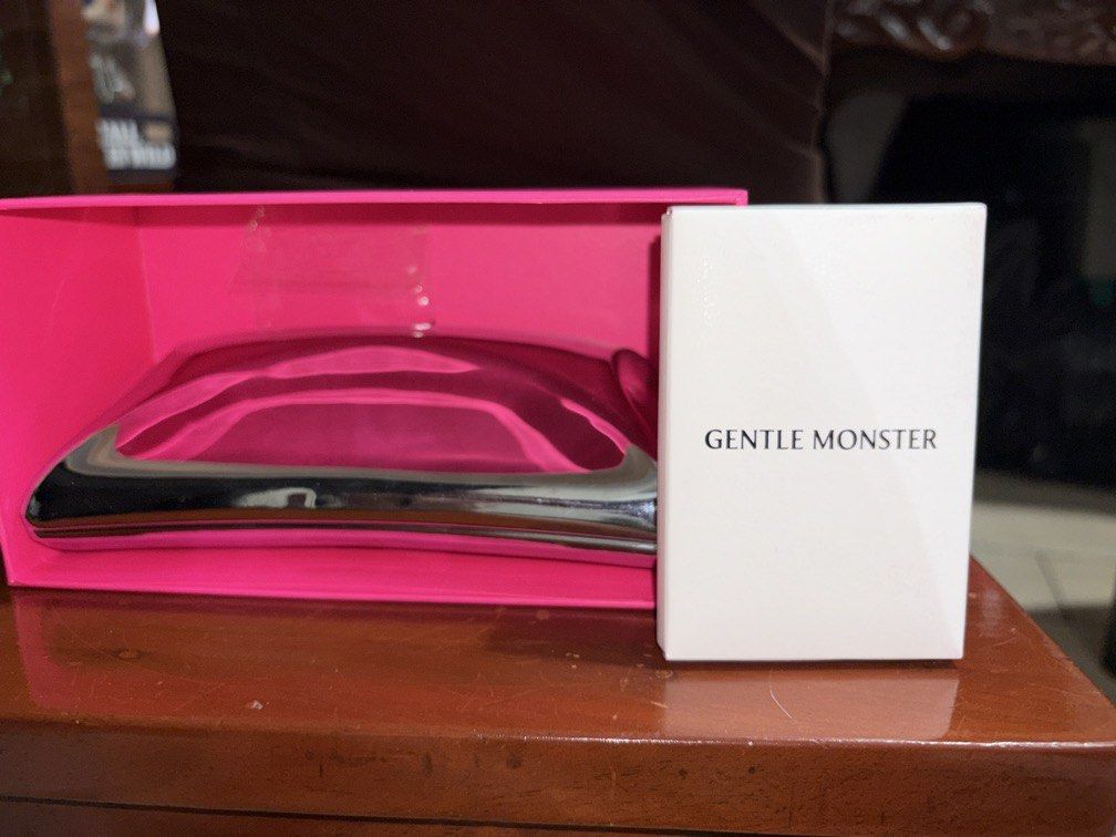 GENTLE MONSTER - Atomic 02 Eyeglasses (Category: Luxury Accessories) located in Manila. Submitted by bbkc_ph (Listing ID 1457304884, Image 3). Description: PRODUCT DETAILS These eyeglasses feature a full rim and a square frame. Gentle Monster: Atomic 02 glasses. Model: Atomic 02 Glasses Brand: GENTLE MONSTER Color: silver.