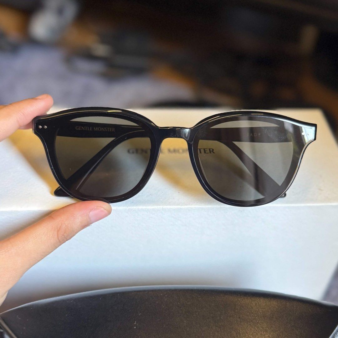 Gentle Monster Black Jade Round Sunglasses (Category: Sunglasses & Eyewear) located in Manila. Submitted by mjoycie (Listing ID 1457295324, Image 1). Description: - Authentic Gentle Monster Jade Sunglasses in black. - Classic round frame design. - Comes with authenticity certificate card, original box and pouch. - Original price is at 15k - Selling as they are not frequently used.