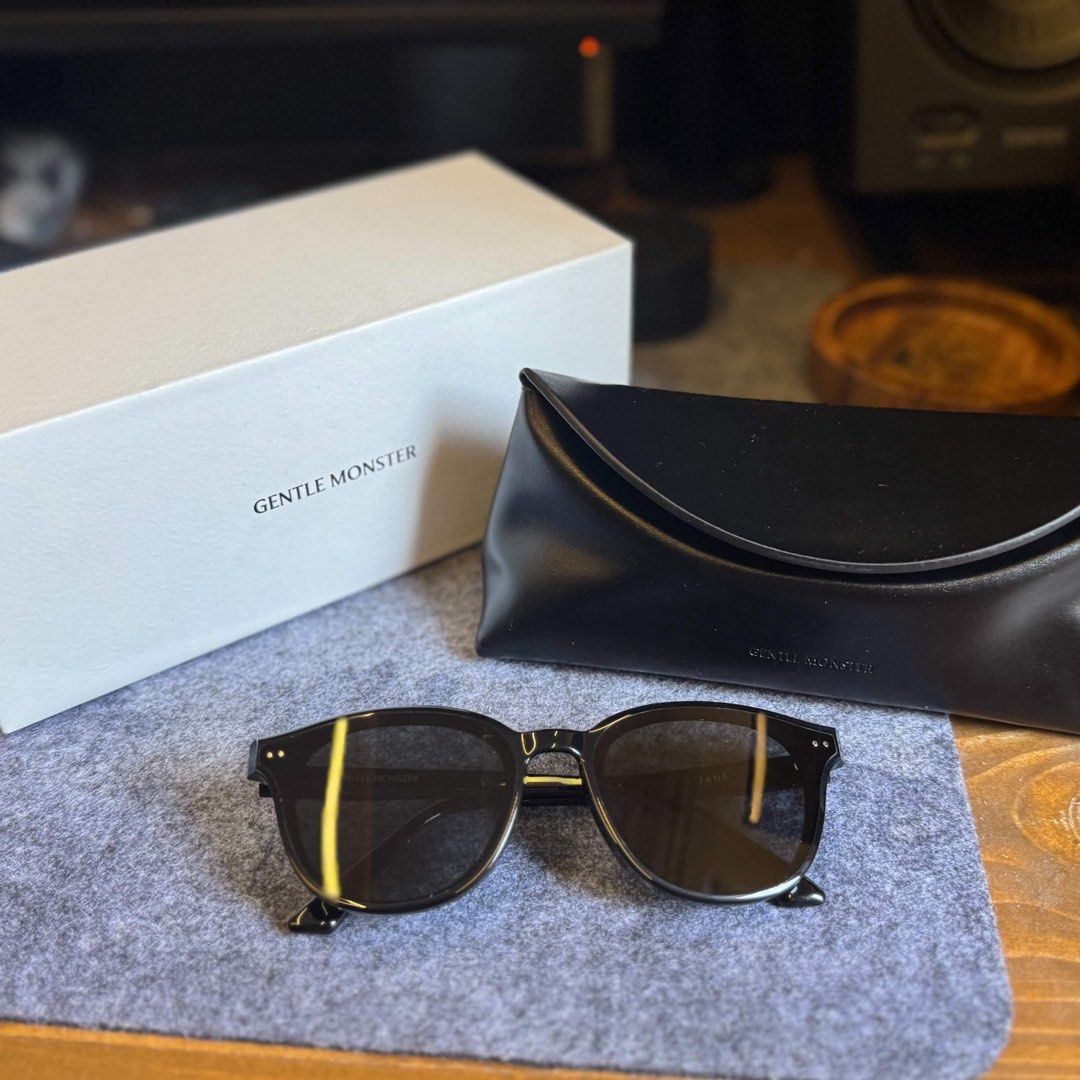 Gentle Monster Black Jade Round Sunglasses (Category: Sunglasses & Eyewear) located in Manila. Submitted by mjoycie (Listing ID 1457295324, Image 3). Description: - Authentic Gentle Monster Jade Sunglasses in black. - Classic round frame design. - Comes with authenticity certificate card, original box and pouch. - Original price is at 15k - Selling as they are not frequently used.