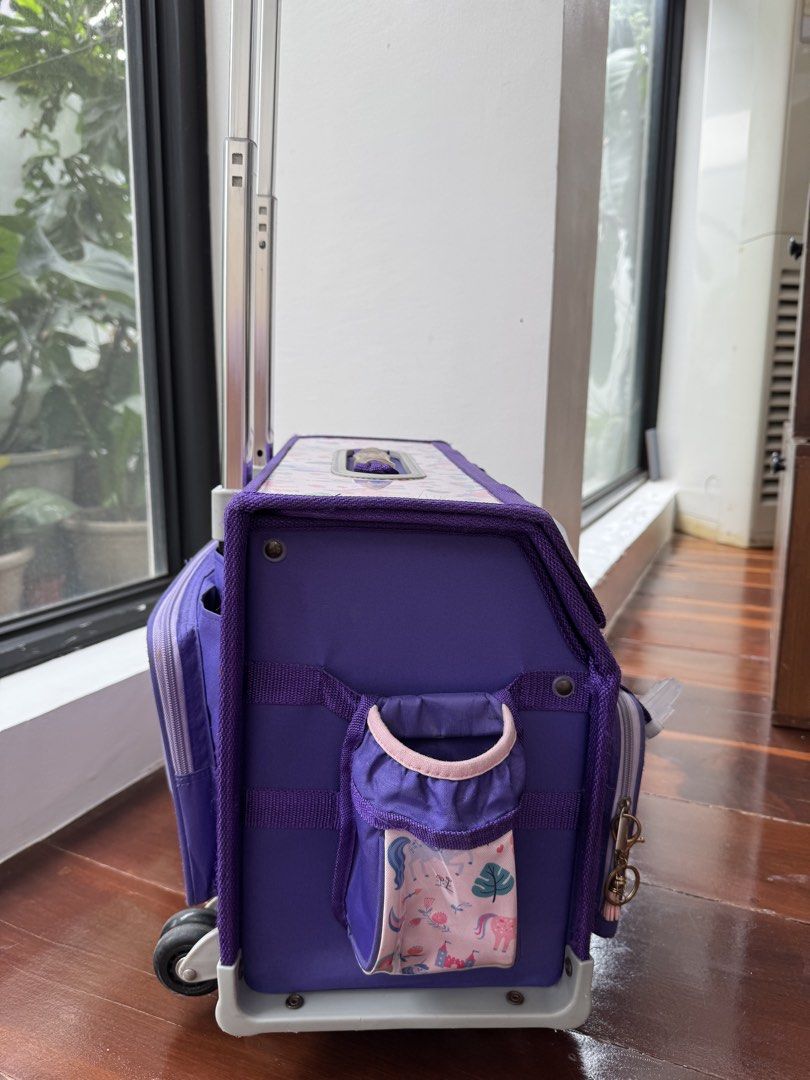Girls Trolley Bag (Category: Babies & Kids Fashion) located in Quezon City. Submitted by nikabc (Listing ID 1457166253, Image 2). Description: - Lily and Tucker trolley school bag - 6 wheel - One clasp broken but can still lock and close - matching lunch box .