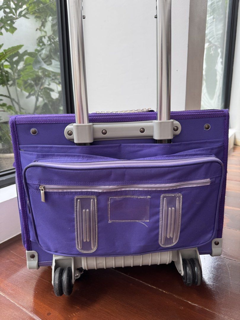 Girls Trolley Bag (Category: Babies & Kids Fashion) located in Quezon City. Submitted by nikabc (Listing ID 1457166253, Image 3). Description: - Lily and Tucker trolley school bag - 6 wheel - One clasp broken but can still lock and close - matching lunch box .
