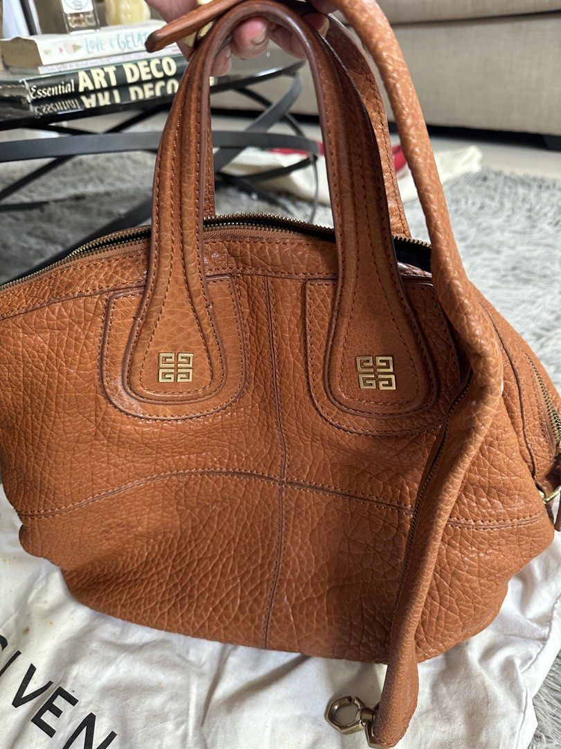 Givenchy Nightingale Bag (Category: Luxury Bags & Wallets) located in Manila. Submitted by marmarpec (Listing ID 1457163390, Image 1). Description: - Authentic Givenchy Nightingale Bag - Color: Tan/Brown - Material: Genuine Leather with pebbled texture - Features iconic Givenchy logo hardware - Versatile carrying options: top handles and detachable shoulder strap - Condition: 4/5 (Good pre-loved condition) -Negotiable - Meetup location: Commonwea