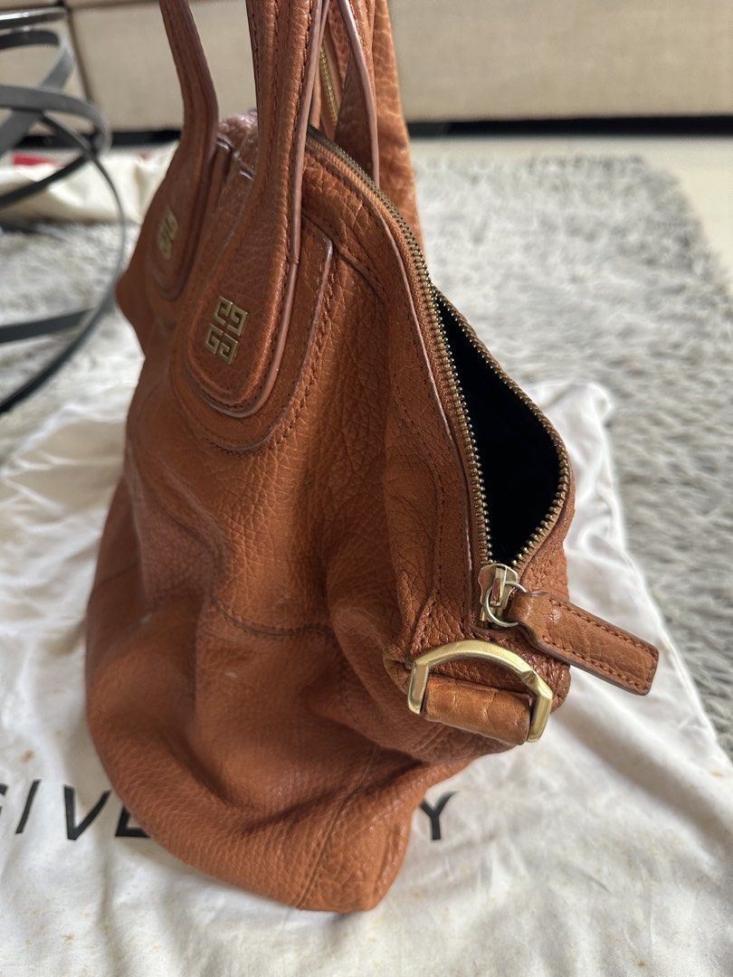 Givenchy Nightingale Bag (Category: Luxury Bags & Wallets) located in Manila. Submitted by marmarpec (Listing ID 1457163390, Image 2). Description: - Authentic Givenchy Nightingale Bag - Color: Tan/Brown - Material: Genuine Leather with pebbled texture - Features iconic Givenchy logo hardware - Versatile carrying options: top handles and detachable shoulder strap - Condition: 4/5 (Good pre-loved condition) -Negotiable - Meetup location: Commonwea