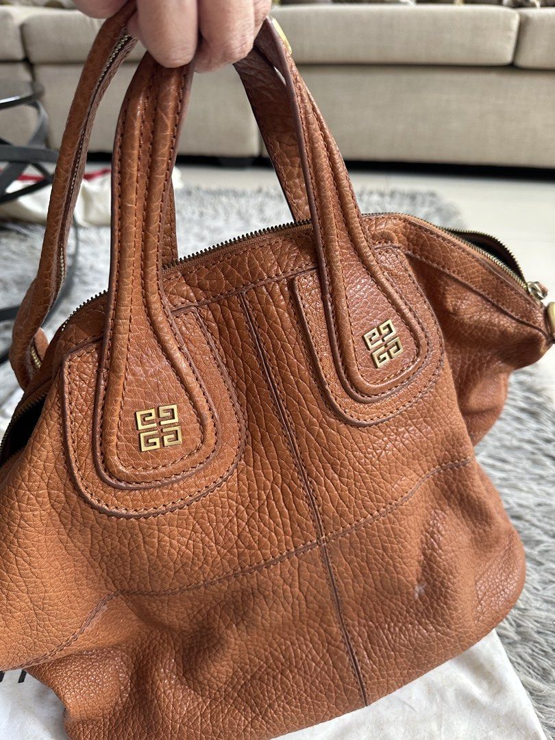 Givenchy Nightingale Bag (Category: Luxury Bags & Wallets) located in Manila. Submitted by marmarpec (Listing ID 1457163390, Image 3). Description: - Authentic Givenchy Nightingale Bag - Color: Tan/Brown - Material: Genuine Leather with pebbled texture - Features iconic Givenchy logo hardware - Versatile carrying options: top handles and detachable shoulder strap - Condition: 4/5 (Good pre-loved condition) -Negotiable - Meetup location: Commonwea