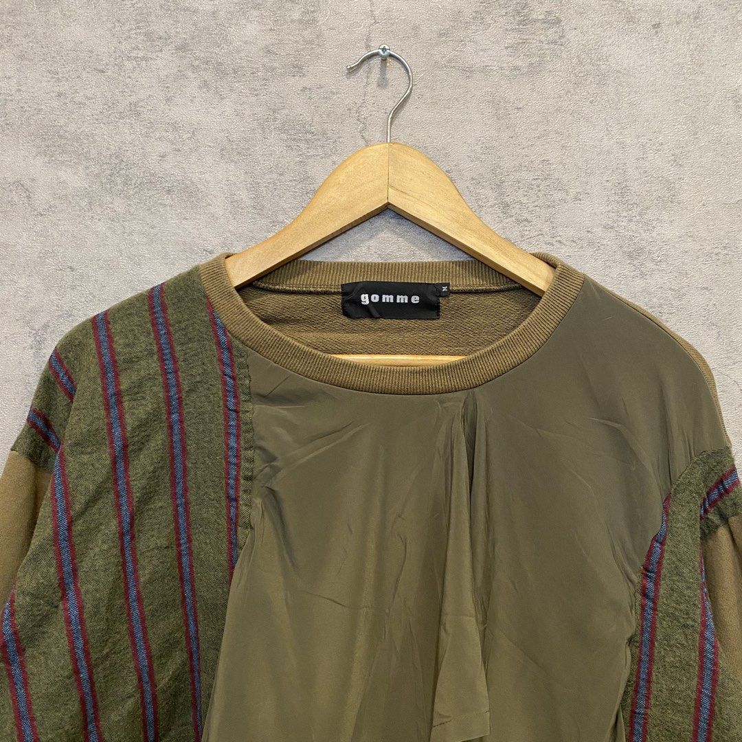 Gomme Asymetrical Patchwork Sweater (Category: Coats, Jackets and Outerwear) located in Quezon City. Submitted by rebirthalley (Listing ID 1457202106, Image 2). Description: Width-23.5 Length-21 Sleeve-19 Shoulder-22 Hem-22 Verygood Condition Need wash only This is an avant-garde olive green Gomme patchwork sweatshirt featuring a deconstructed front drape and striped side panels. .