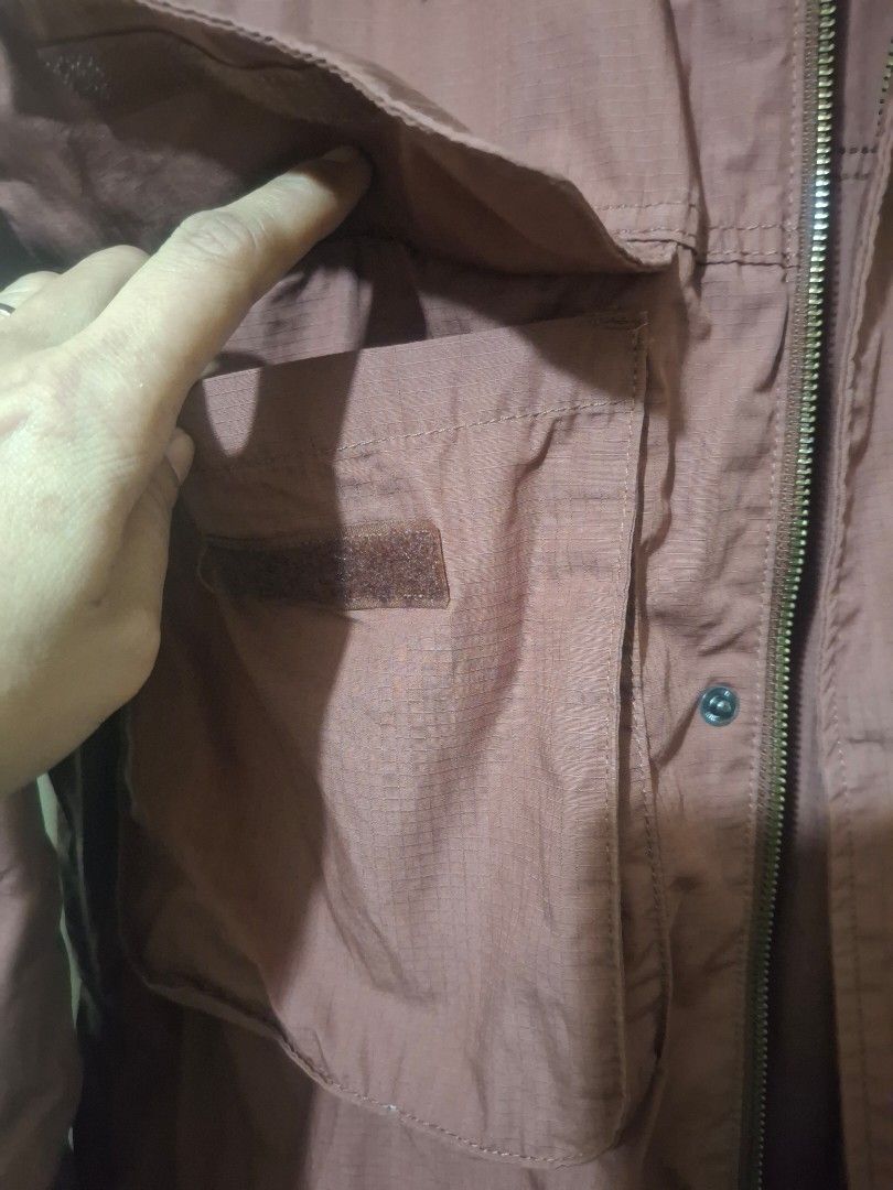 GU Hooded Utility Jacket - Brown (Category: Coats, Jackets and Outerwear) located in Manila. Submitted by annasigrid33015 (Listing ID 1457268393, Image 3). Description: - GU brown hooded jacket - Zip and button closure - Multiple front pockets - Drawstring hem - Button closure on sleeve cuffs - Lightweight material, ideal for layering.