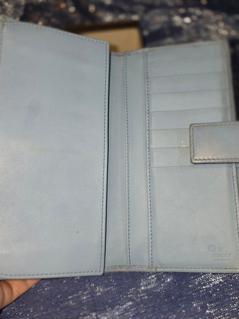 GUCCI Leather Wallet Light Blue (Category: Luxury Bags & Wallets) located in Quezon City. Submitted by mineg (Listing ID 1457231527, Image 2). Description: - Authentic light blue Gucci wallet - Features the signature Microguccissima pattern all over - Comes with its original Gucci box.
