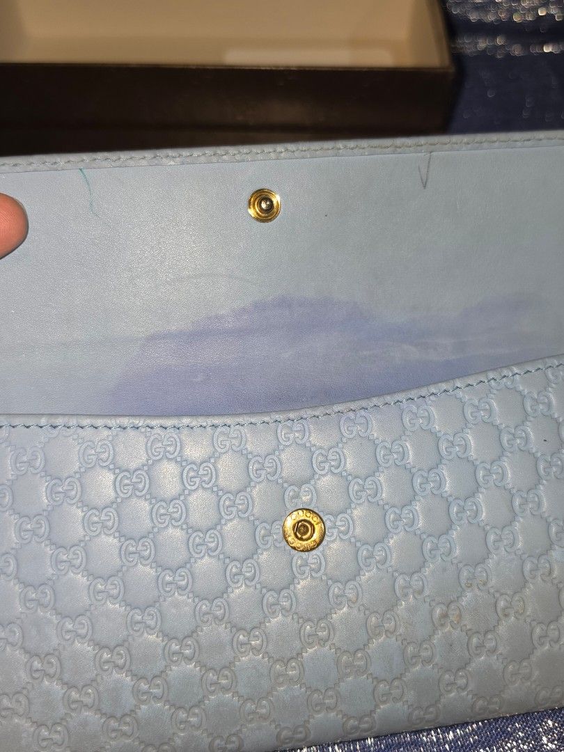 GUCCI Leather Wallet Light Blue (Category: Luxury Bags & Wallets) located in Quezon City. Submitted by mineg (Listing ID 1457231527, Image 3). Description: - Authentic light blue Gucci wallet - Features the signature Microguccissima pattern all over - Comes with its original Gucci box.