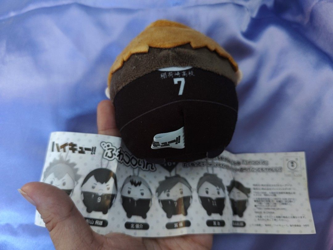 Haikyuu Atsumu Miya plush (Category: Plushies & Soft Toys) located in Manila. Submitted by liminalgirl (Listing ID 1457173123, Image 2). Description: -Atsumu Miya plush from Haikyuu Fuwakororin merch line -Authentic plushie -No paper tag but comes with this little pamphlet -Minor defect: has a bit of black smudge on his eye. Probably from being decked in the face by his twin brother but who's to say..