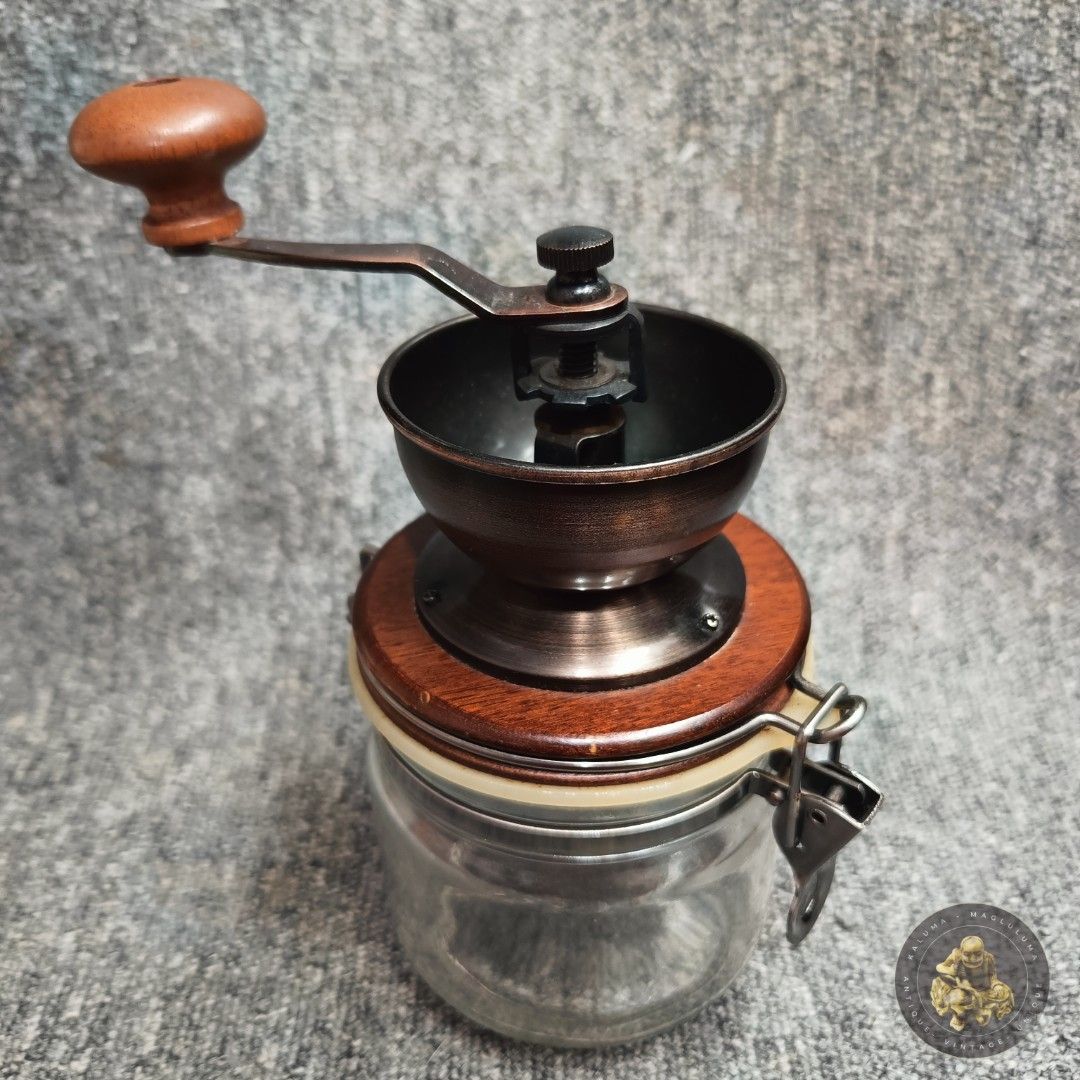 Hario Canister Ceramic Coffee Mill (Category: Coffee & Tea Tableware) located in Meycauayan. Submitted by ka_luma (Listing ID 1457164328, Image 2). Description: Hario Canister Ceramic Coffee Mill (model CMHN-4), a manual grinder that allows you to grind fresh coffee beans directly into an airtight glass storage jar..