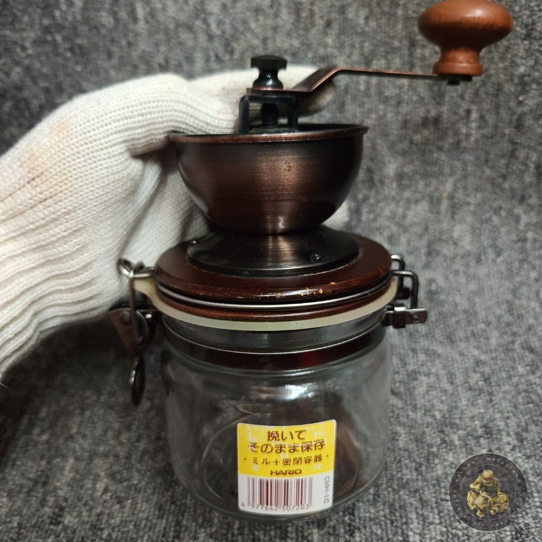 Hario Canister Ceramic Coffee Mill (Category: Coffee & Tea Tableware) located in Meycauayan. Submitted by ka_luma (Listing ID 1457164328, Image 3). Description: Hario Canister Ceramic Coffee Mill (model CMHN-4), a manual grinder that allows you to grind fresh coffee beans directly into an airtight glass storage jar..