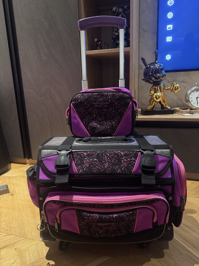 Hawk Trolley Bag Set (Category: Other Babies Going Out Needs) located in Paranaque City. Submitted by eyeittryitbuyit (Listing ID 1457316712, Image 1). Description: Hawk Trolley Bag Set For Sale!! Php 1850.00 Black/Purple/Pink Selling my HAWK trolley bag set, perfect for school use. Authentic HAWK brand Large trolley school bag Retractable handle Multiple compartments and pockets Includes matching small bag/pouch Black, purple & pink design Wheel