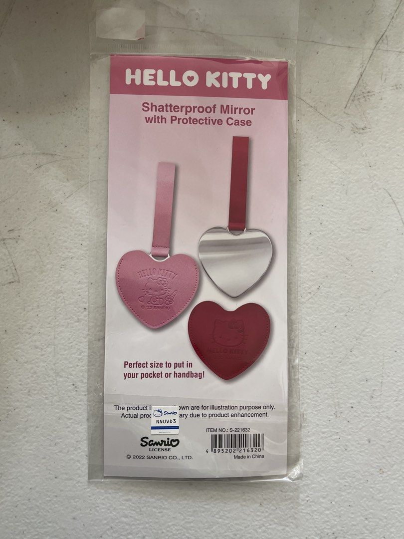 Hello Kitty Shatterproof Mirror with Protective Case Keychain (Category: Mirrors) located in Manila. Submitted by phoebe1.23.7 (Listing ID 1457207243, Image 2). Description: - Adorable pink heart-shaped Kitty mirrors - Shatterproof for safety - Includes a protective case - Features a convenient strap for attaching to bags - Ideal for quick makeup touch-ups anywhere .