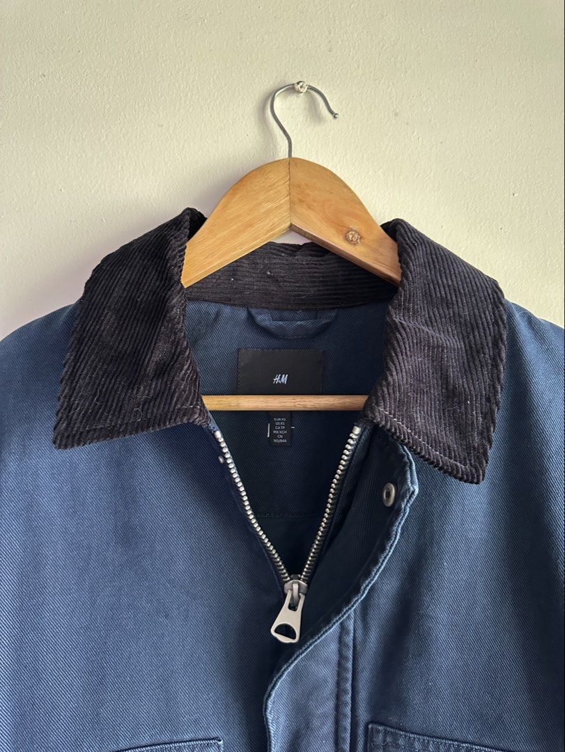 H&M Blue Workwear Jacket (Category: Coats, Jackets and Outerwear) located in Manila. Submitted by mrflyboy (Listing ID 1457274901, Image 2). Description: - Classic blue H&M workwear jacket - Used once - Dark corduroy collar - Zip-up front closure - Two large front pockets with button closures - Simple, durable design - Perfect for layering.
