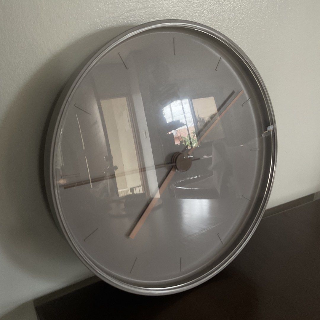 IKEA BONDTOLVAN Wall Clock (Category: Clocks) located in Marilao. Submitted by thewoodstudio (Listing ID 1457220410, Image 1). Description: Designed by Aaron Probyn, this 25 cm (9 ¾”) modern timepiece features a minimalist grey face with elegant pink/rose gold hands and operates with a completely silent quartz movement..