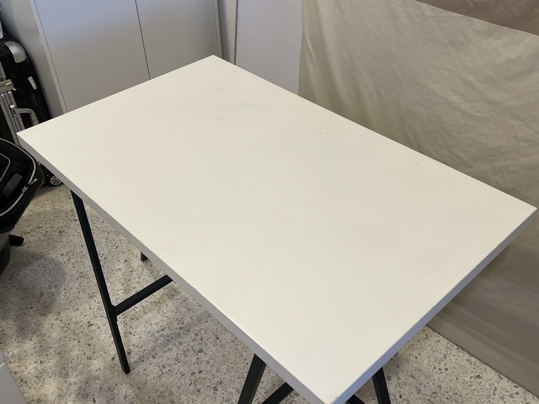 Ikea Table (Category: Tables & Sets) located in Kuala Lumpur. Submitted by wildentan (Listing ID 1457213887, Image 2). Description: - Ikea white desk (100cm x 60cm) - Exclude table legs - Ideal size for study or work area - Tabletop has minor scratches and marks from use - Easy to assemble and disassemble - Great for small spaces.