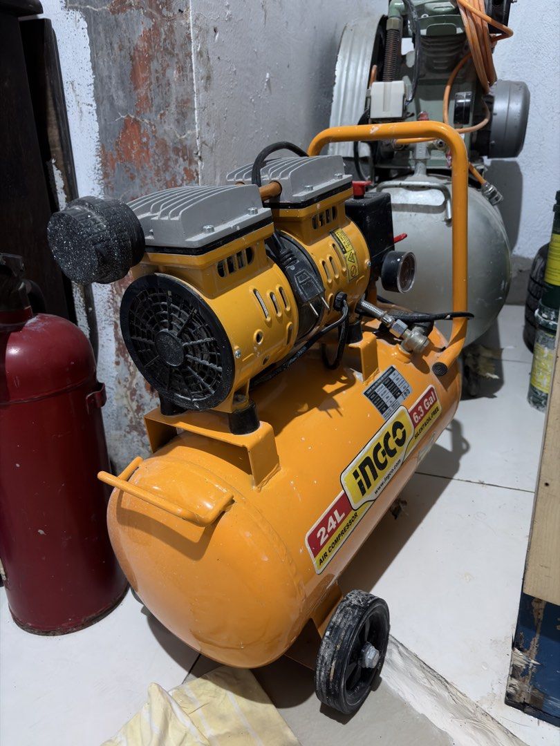 INGCO 24L Silent Oil-Free Air Compressor (Category: Construction Tools & Equipment) located in Cavite. Submitted by boggsbognot (Listing ID 1457187331, Image 1). Description: - INGCO 24L Air Compressor - Silent operation - Oil-free design - 6.3 Gallon tank capacity - Versatile for various tasks - In excellent working condition - Ready for its new owner.