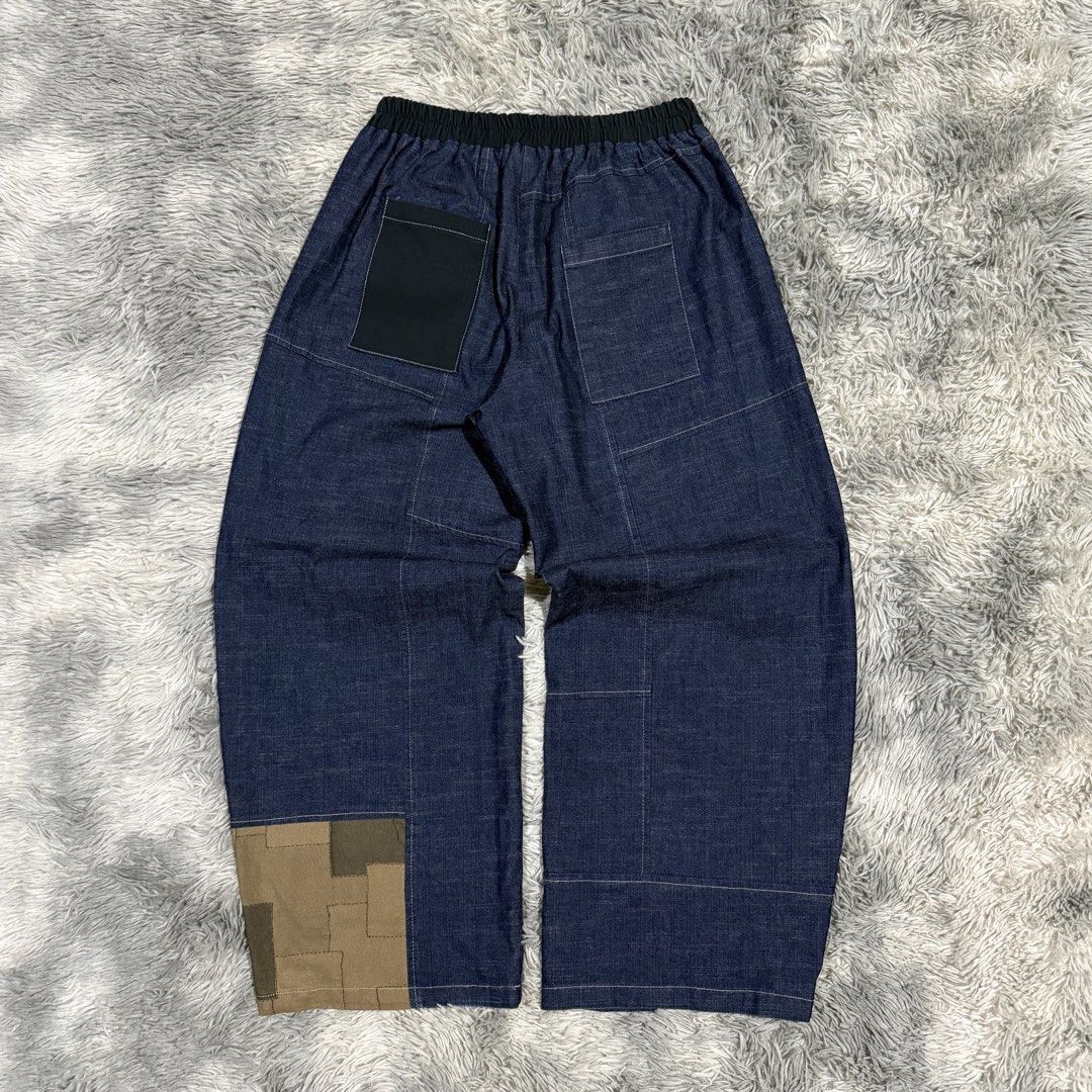 Japanese Patchwork Pants (Category: Jeans) located in Mandaluyong City. Submitted by iamkageki (Listing ID 1457188071, Image 1). Description: Waist 28-32 Length 37.5 Leg op 10 No issue / excellent condition.
