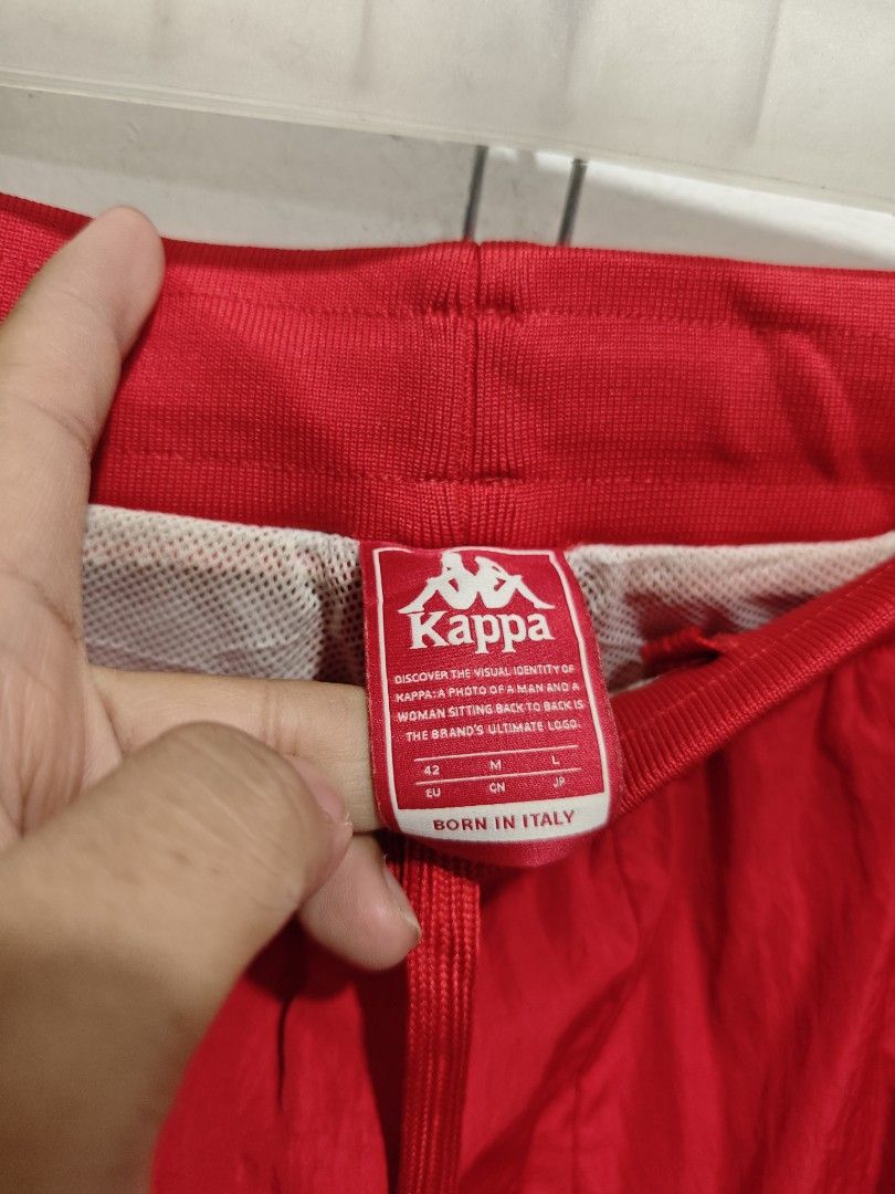 Kappa Red Track Pants with Logo Tape (Category: Joggers) located in Bulacan. Submitted by pzj_thrift (Listing ID 1457239484, Image 3). Description: Kap L 38 W 28-32 Condition 9/10 Color rate 9/10 No issue .