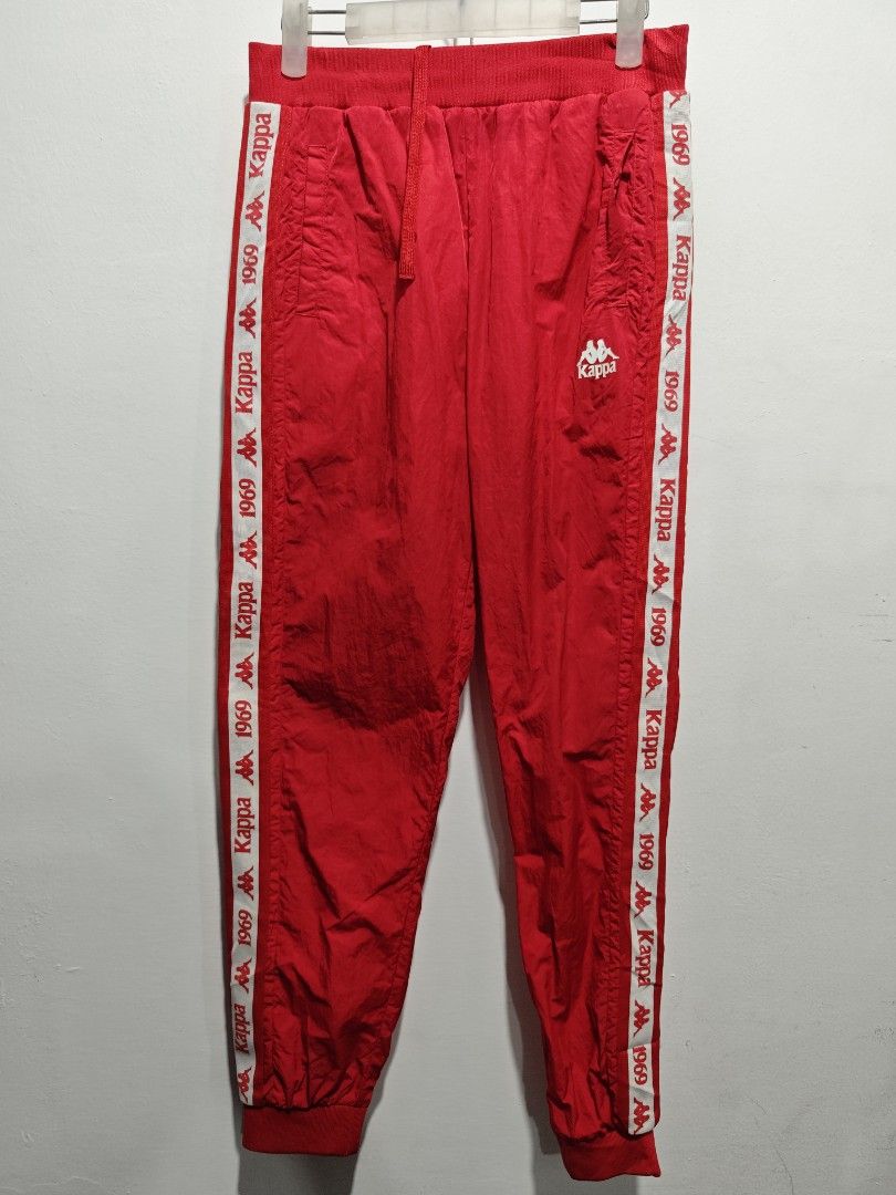 Kappa Red Track Pants with Logo Tape (Category: Joggers) located in Bulacan. Submitted by pzj_thrift (Listing ID 1457239484, Image 1). Description: Kap L 38 W 28-32 Condition 9/10 Color rate 9/10 No issue .