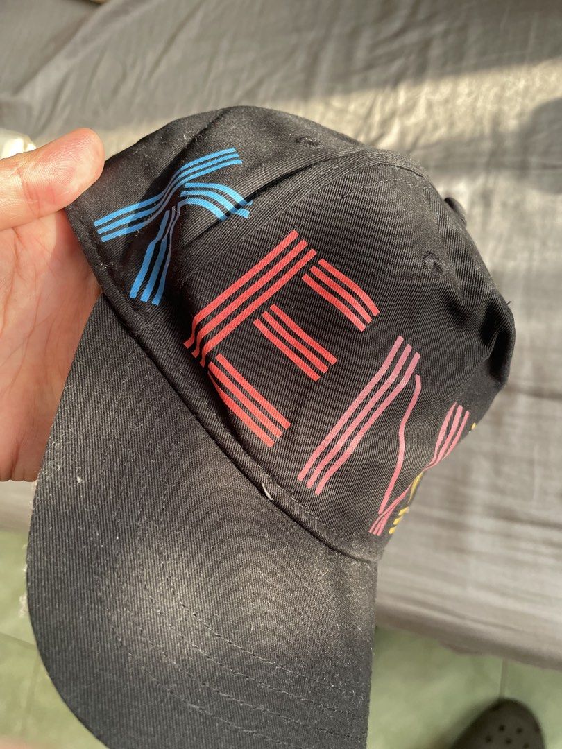 Kenzo Paris Black Cap with Colorful Logo (Category: Caps & Hats) located in Santa Barbara. Submitted by frryt (Listing ID 1457171561, Image 2). Description: - Black Kenzo cap - Features colorful Kenzo Paris logo on front - Adjustable strap at the back - Perfect for everyday wear.