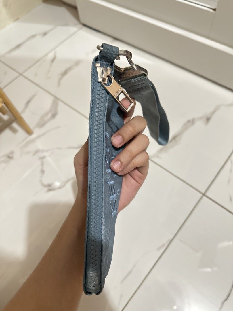 Kenzo Wristlet Bag (Category: Luxury Bags & Wallets) located in Rizal. Submitted by miss2lyps (Listing ID 1455405432, Image 3). Description: - Detachable wrist/shoulder strap - Visible signs of use/wear on the zipper and fabric (needs cleaning!).