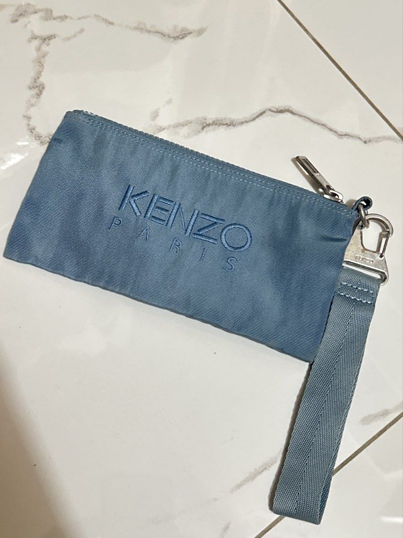 Kenzo Wristlet Bag (Category: Luxury Bags & Wallets) located in Rizal. Submitted by miss2lyps (Listing ID 1455405432, Image 2). Description: - Detachable wrist/shoulder strap - Visible signs of use/wear on the zipper and fabric (needs cleaning!).