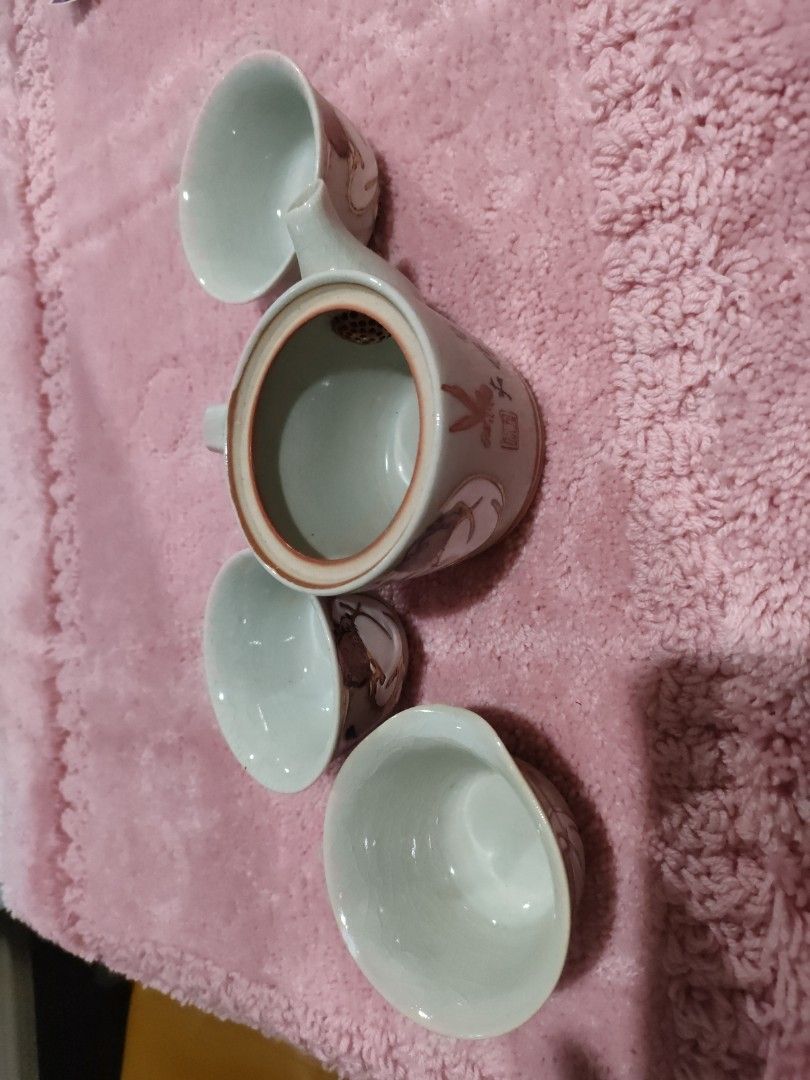 Kutani ware tea Set with Teapot and Cups (Category: Coffee & Tea Tableware) located in Bulacan. Submitted by hunterherojapanjdm (Listing ID 1457288130, Image 2). Description: - vintage Kutani ware tea set features a small ceramic teapot and matching handleless teacups adorned with traditional hand-painted motifs. - Includes teapot and 3 small cups - Features intricate hand-painted designs (insects, mythical creatures) - Lovely crackle glaze effec