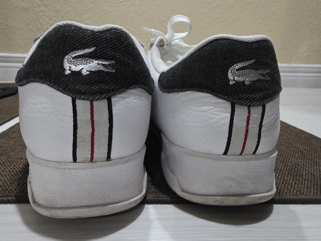 Lacoste White Leather Sneakers with Crocodile Logo (Category: Sneakers) located in Quezon City. Submitted by potion_slayer32 (Listing ID 1457149782, Image 3). Description: - White leather Lacoste sneakers - Iconic green crocodile logo on the side - Perforated details on the toe box - Striped accent on the heel - White laces - Ideal for casual wear - No box. I bought these from AU.