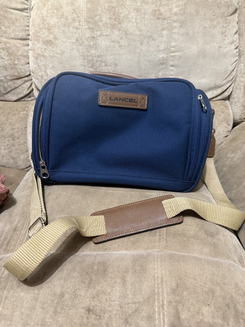 LANCEL Canvas Travel Bag (Category: Luxury Bags & Wallets) located in Manila. Submitted by cocoscloset23 (Listing ID 1457235639, Image 2). Description: - LANCEL Canvas Travel Bagv - Pre-loved condition: 9/10 - Includes dust bag - never used, but it’s old and left in the cabinet for so long - no issues with the inside of the bag Shipping c/o buyer Strictly delivery only. No meet ups ❌ 📍 Parañaque.