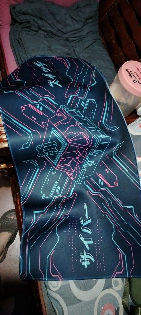 Large Cyberpunk Style Gaming Mousepad (Category: Mouse & Mousepads) located in Manila. Submitted by santanking (Listing ID 1457262771, Image 2). Description: - Large Cyberpunk Mousepad (approx. 80cm x 30cm) - Features a striking cube graphic with neon blue and pink lines - Smooth surface for optimal mouse control - Ideal for enhancing your gaming setup or desk aesthetic - Check photos for the precise design details Malinis na malinis kakalaba ko 