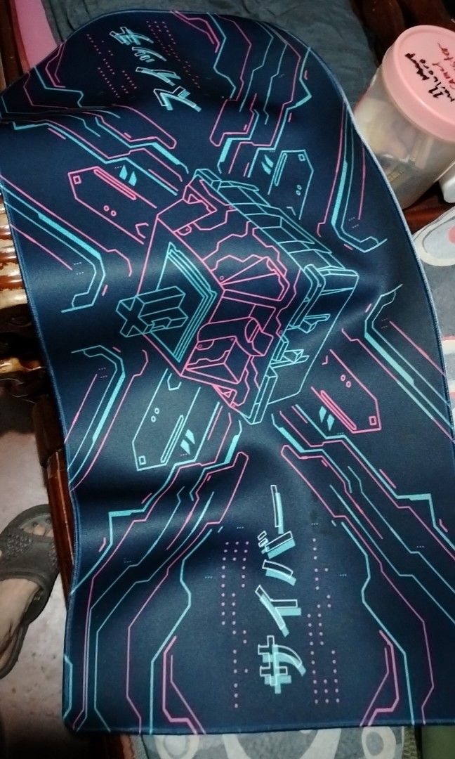 Large Cyberpunk Style Gaming Mousepad (Category: Mouse & Mousepads) located in Manila. Submitted by santanking (Listing ID 1457262771, Image 1). Description: - Large Cyberpunk Mousepad (approx. 80cm x 30cm) - Features a striking cube graphic with neon blue and pink lines - Smooth surface for optimal mouse control - Ideal for enhancing your gaming setup or desk aesthetic - Check photos for the precise design details Malinis na malinis kakalaba ko 