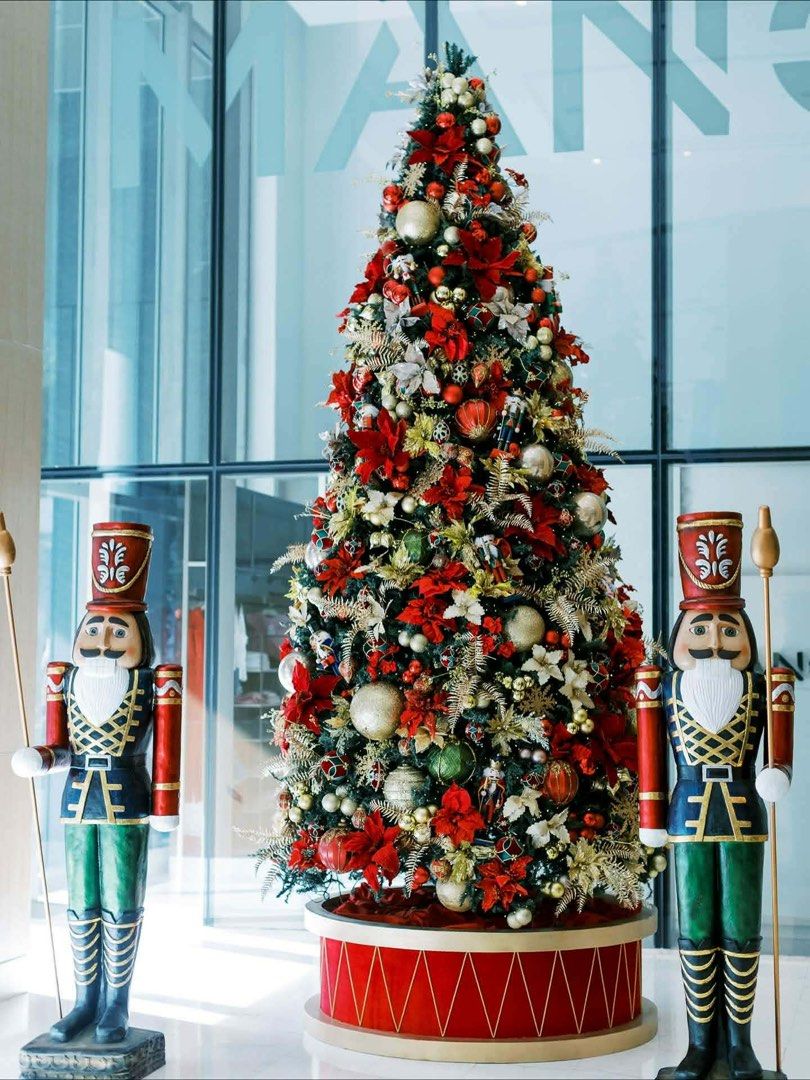Large Decorated Christmas Tree with Ornaments and Lights (Category: Other Home Decor) located in Manila. Submitted by jamesgani08 (Listing ID 1457149882, Image 1). Description: - Beautifully decorated Christmas tree - Features red, gold, and white ornaments - Includes poinsettias and ribbons - Comes with warm LED lights - Creates a festive atmosphere for home or office - Ready to bring holiday cheer!.