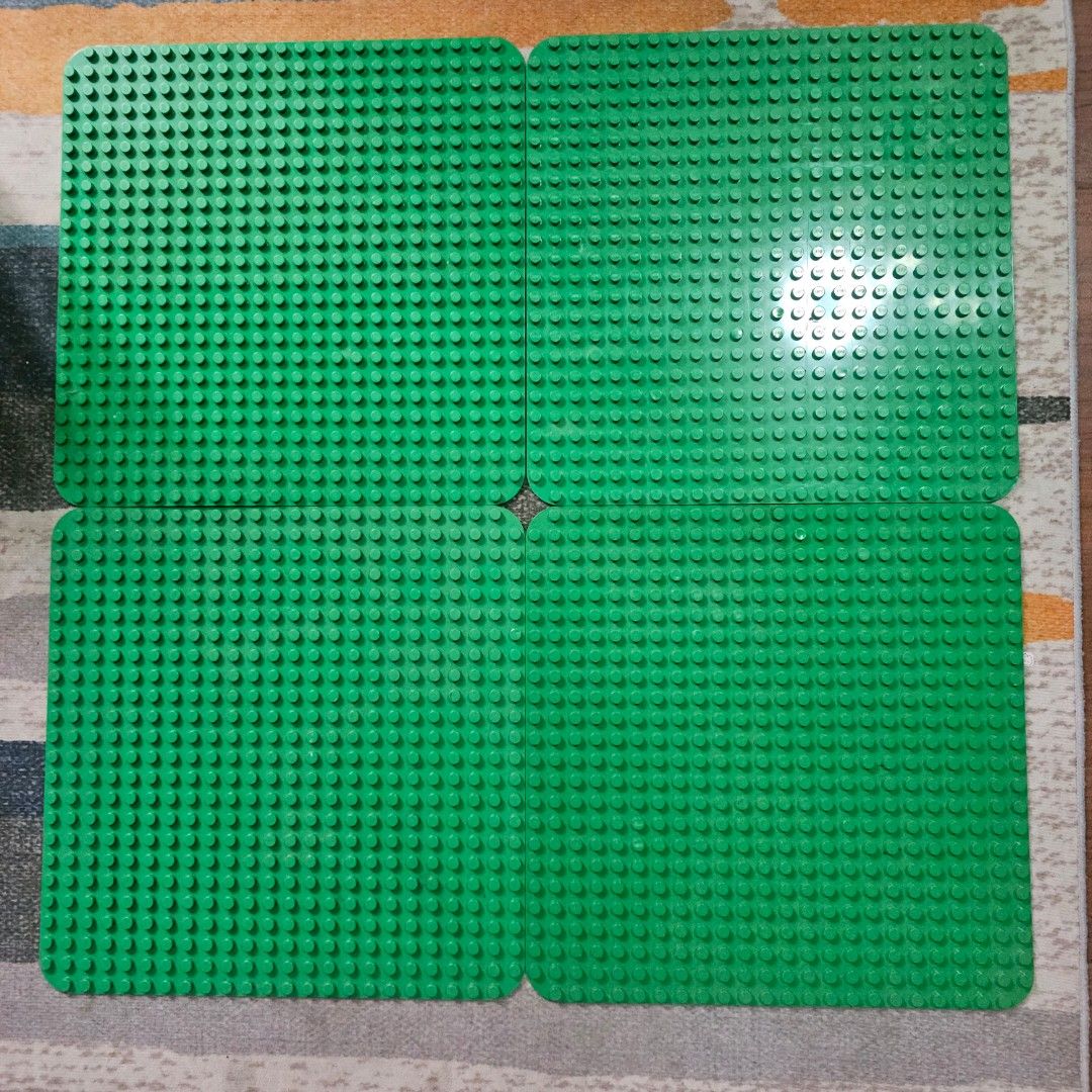 Lego Duplo Green Base Plates for Building Blocks (Category: Lego & Building Sets) located in Quezon City. Submitted by northernlegends (Listing ID 1457163369, Image 2). Description: 2.5k for 4 base plates 750 if sold separately 3k if you'll get the set and 2 smaller ones Four green base plates. Connect them together to create a larger building surface. Great for organizing and displaying your creations. Perfect for kids who love building. Get cre