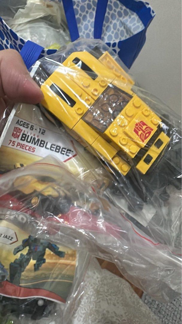 LEGO Transformers Bumblebee 75 Pieces Ages 6-12 (Category: Lego & Building Sets) located in Taytay. Submitted by rapdelcastillo (Listing ID 1457292815, Image 1). Description: - Brand new LEGO Bumblebee set - 75 pieces - Recommended for ages 6-12 - Features visible Autobot logo on the car - Includes a smaller figure resembling Jazz - All pieces are sealed in original plastic bags.