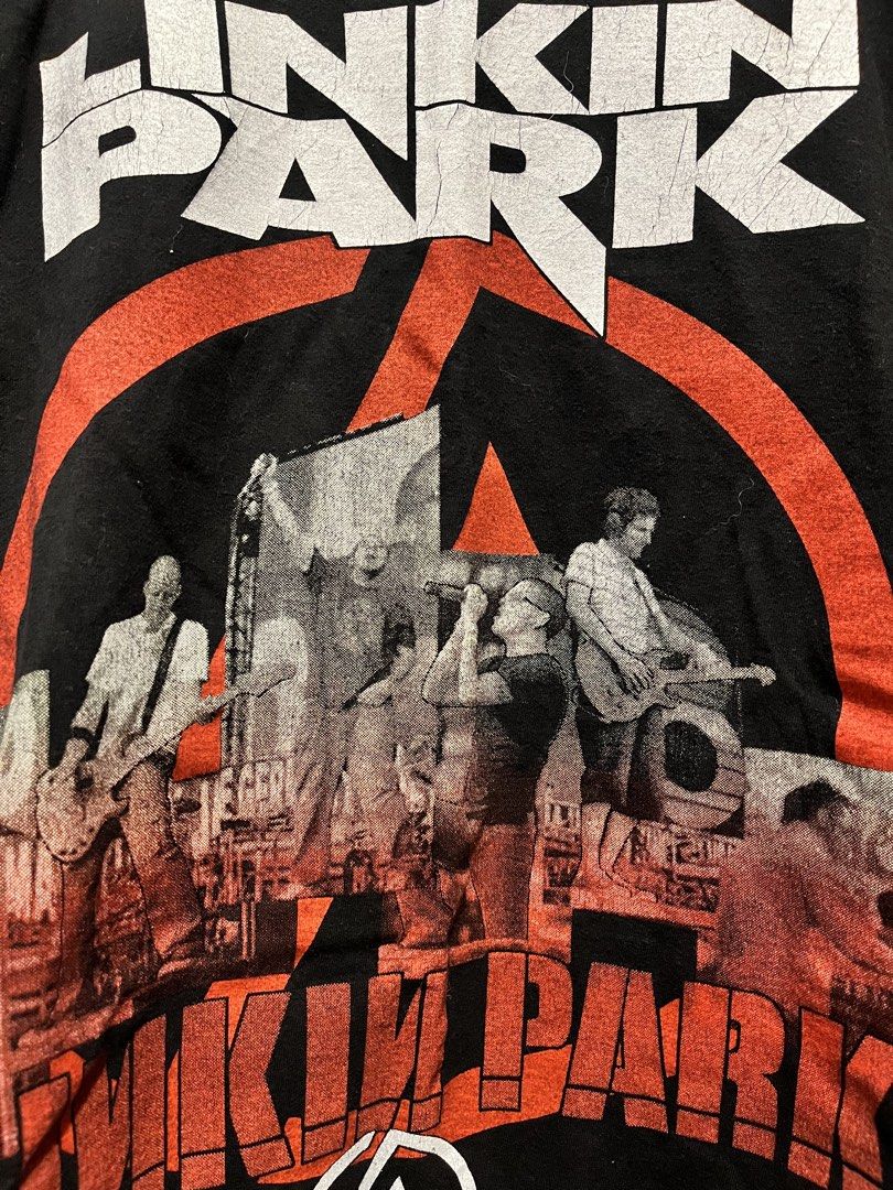 Linkin Park band shirt (Category: Tshirts & Polo Shirts ) located in Quezon City. Submitted by vwfndrskprs (Listing ID 1457318424, Image 3). Description: Linkin Park band tee Size M on tag; best fits S men; S-M women 17.5” width x 26.5” length 100% ring-spun, heavyweight cotton; no side seams In excellent used condition; not faded; some hairline cracks on the print .