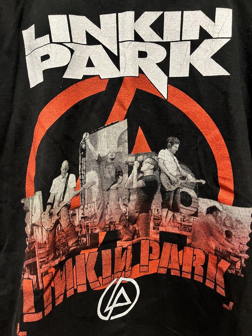 Linkin Park band shirt (Category: Tshirts & Polo Shirts ) located in Quezon City. Submitted by vwfndrskprs (Listing ID 1457318424, Image 2). Description: Linkin Park band tee Size M on tag; best fits S men; S-M women 17.5” width x 26.5” length 100% ring-spun, heavyweight cotton; no side seams In excellent used condition; not faded; some hairline cracks on the print .