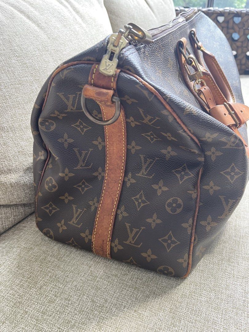 Louis Vuitton Keepall 45 (Category: Luxury Bags & Wallets) located in Quezon City. Submitted by albumguy (Listing ID 1457150316, Image 3). Description: For sale is a vintage Keepall 45 bandouliere, complete with bag tag and lock and key. Haven’t been using for several years already. Bag only. Guaranteed original..