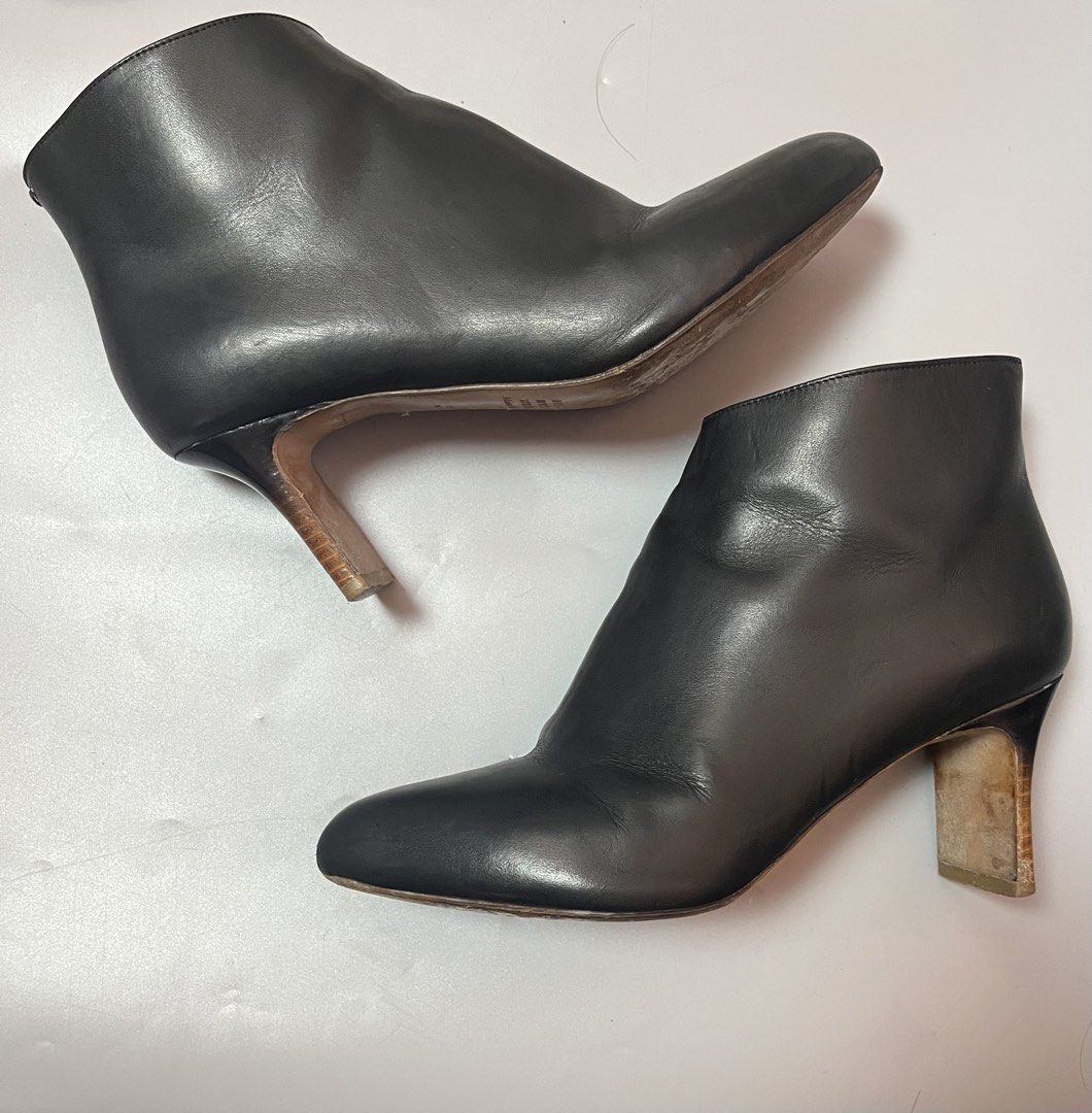 Maison Margiela leather heeled ankle boots (Category: Boots) located in Quezon City. Submitted by theideal (Listing ID 1457196218, Image 2). Description: Read first before buy Legit/authentic Maison Margiela leather heeled ankle boots No box Size 36 fits 6 womens Still in good and presentable condition Crease and scratch due to sign of use No major flaws See picture details posted.