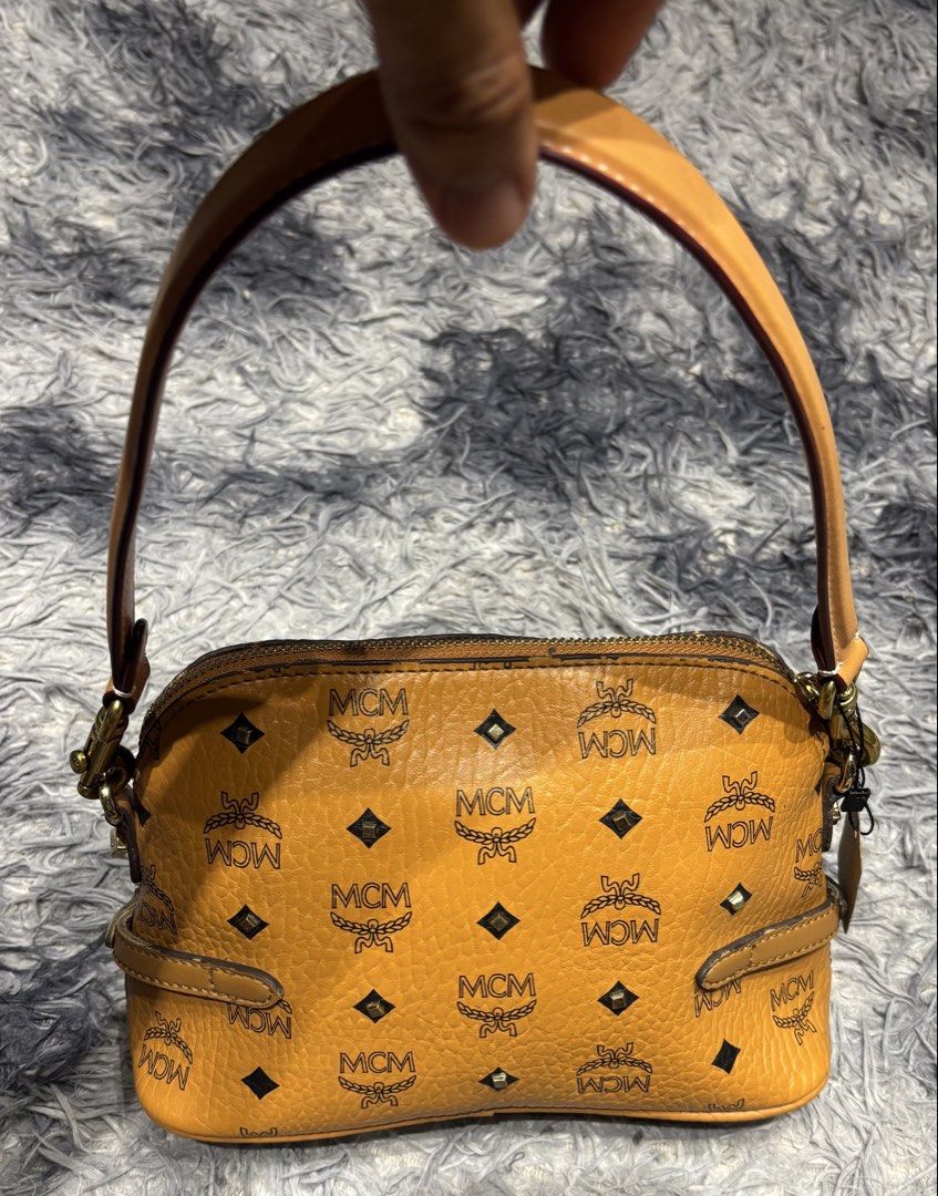 MCM KILI BAG (Category: Luxury Bags & Wallets) located in Legazpi City. Submitted by thesource052 (Listing ID 1457316301, Image 2). Description: MCM KILIBAG/ SHOULDER BAG SMALL - MEDIUM SIZE RUBBER LINING ISSUE AUTHENTIC MADE IN KOREA WITH SCRATCH SA LOWER PART CHECK DETAILS .