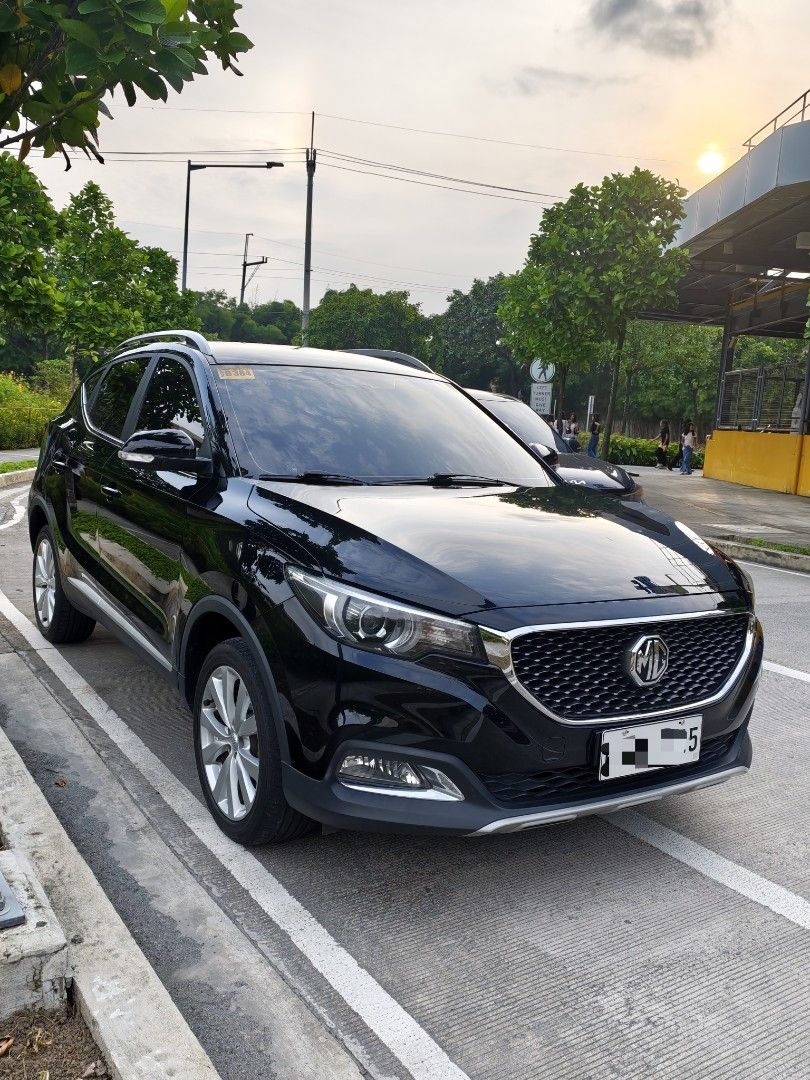 MG ZS (Category: Used Cars) located in Quezon City. Submitted by prelovedbykty (Listing ID 1457252071, Image 1). Description: FOR SALE MG ZS 2023 Php 430,000 (slightly nego) Acquired Sept 2024 (second hand owner) 23,500+ odometer All stocks except for the android unit Stock stereo still on hand (can provide) With spare tire unused Matting included, trunk matting also Sun visors still with plastic Minor scratches due to daily use Ceramic coated la