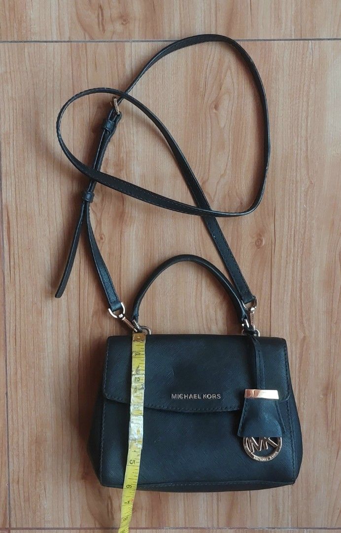 Michael Kors Ava Extra-Small Crossbody Bag (Category: Luxury Bags & Wallets) located in Davao. Submitted by wengbagstuff (Listing ID 1457141740, Image 3). Description: ✅️ extra small size, saffiano leather ✅️ signs of usage-dryness sa top handle (see pics).