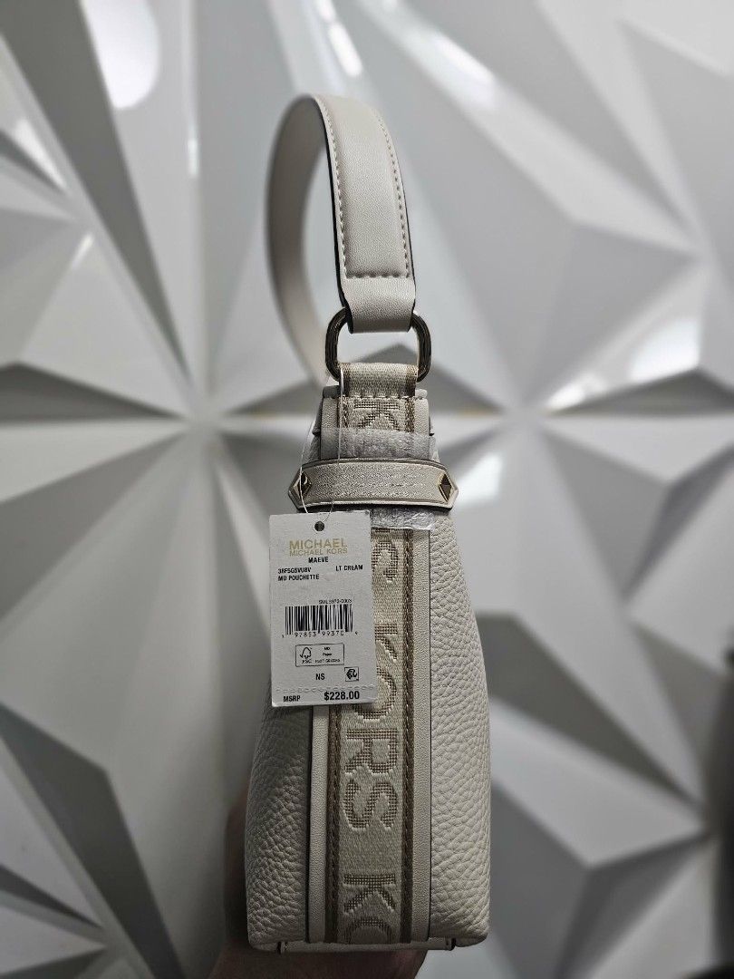 Michael Kors Maive XS Shoulder Bag (Category: Luxury Bags & Wallets) located in Manila. Submitted by liorix (Listing ID 1457296207, Image 2). Description: All bags are **brand new and authentic, straight from the US!** 🇺🇸👜 These are my BF’s mom’s bags that have never been used since she already has plenty of bags. So, we’re letting them go at a good price! 🤍 Just PM me if you’re interested! ☺️ 📍 **Location:** Can meet along the LRT lines. - 