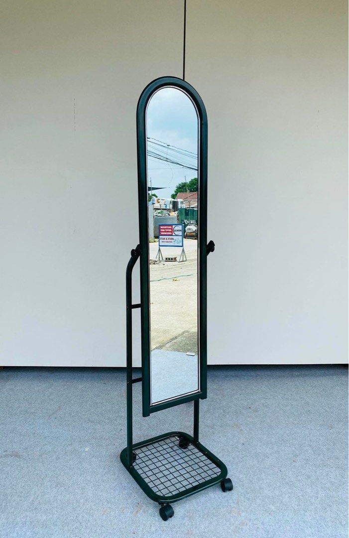 MINIMALIST MIRROR STAND DARK GREEN COLOR (Category: Other Home Furniture) located in Manila. Submitted by _chinixx (Listing ID 1457279863, Image 1). Description: "JAPAN SURPLUS" MINIMALIST MIRROR STAND DARK GREEN COLOR SIZE: 11.5L x 62H inches (AS-IS ITEM) IN GOOD CONDITION.