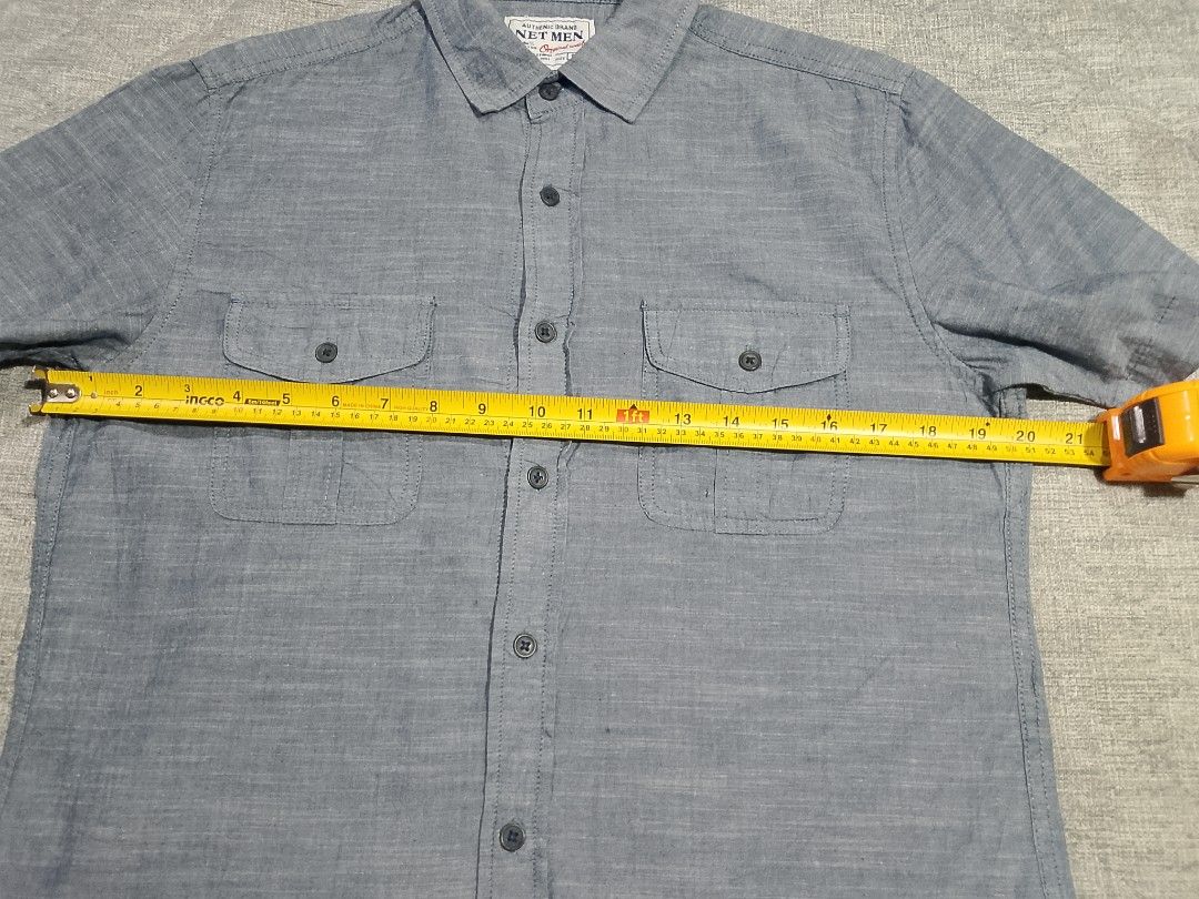 Net Men short sleeve button down Chambray shirt (Category: Tshirts & Polo Shirts ) located in Cadiz. Submitted by comradstuff (Listing ID 1457180001, Image 2). Description: Net Men short sleeve button down Chambray shirt w 20" l 27".